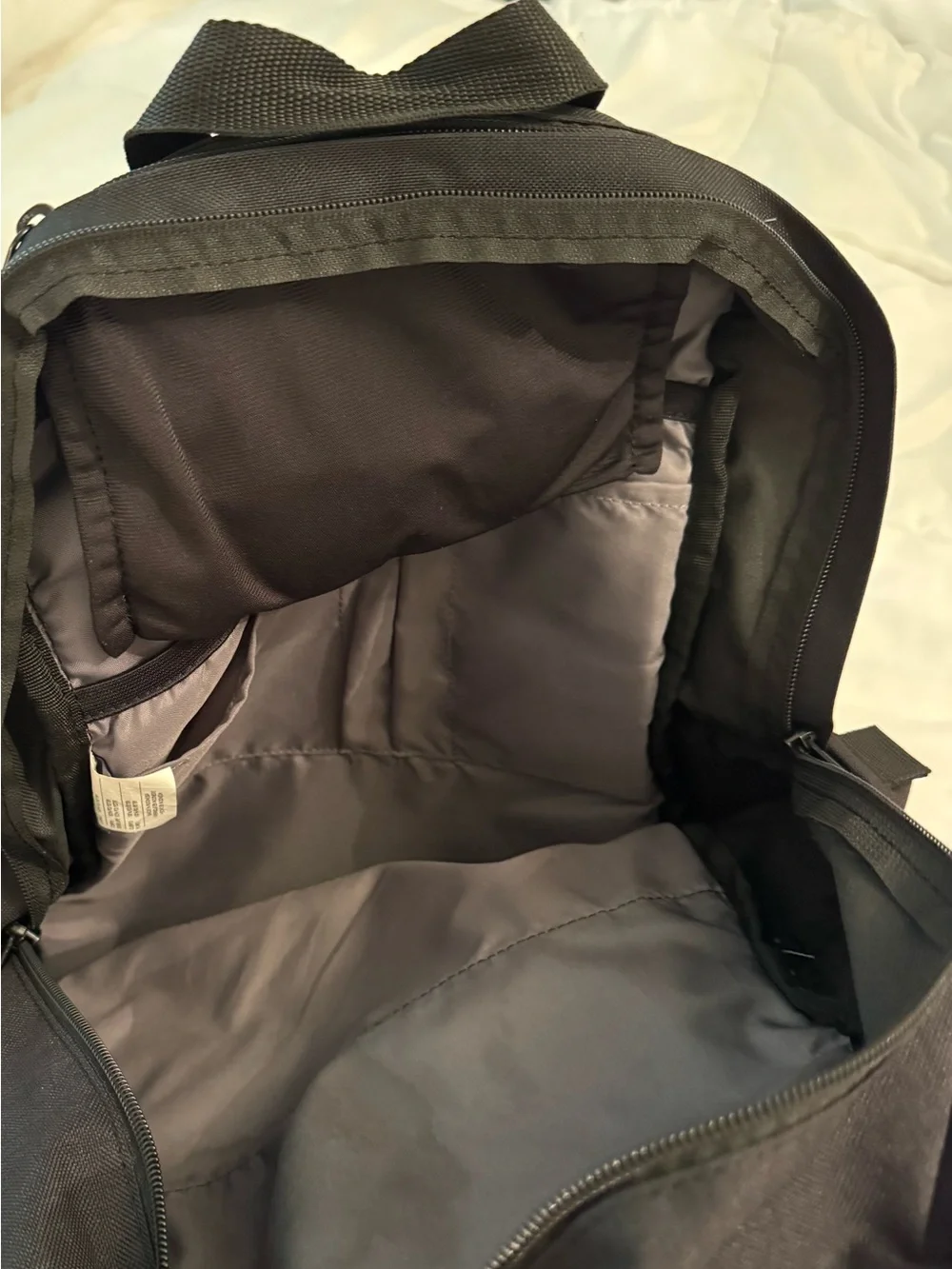 Nike Men's Black Backpack with White Swoosh